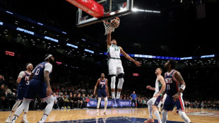 Record-setting Giannis lifts Bucks over Nets