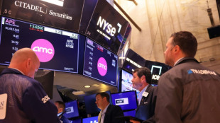 Wall Street termina al alza, en calma antes de mensaje de presidente de la Fed