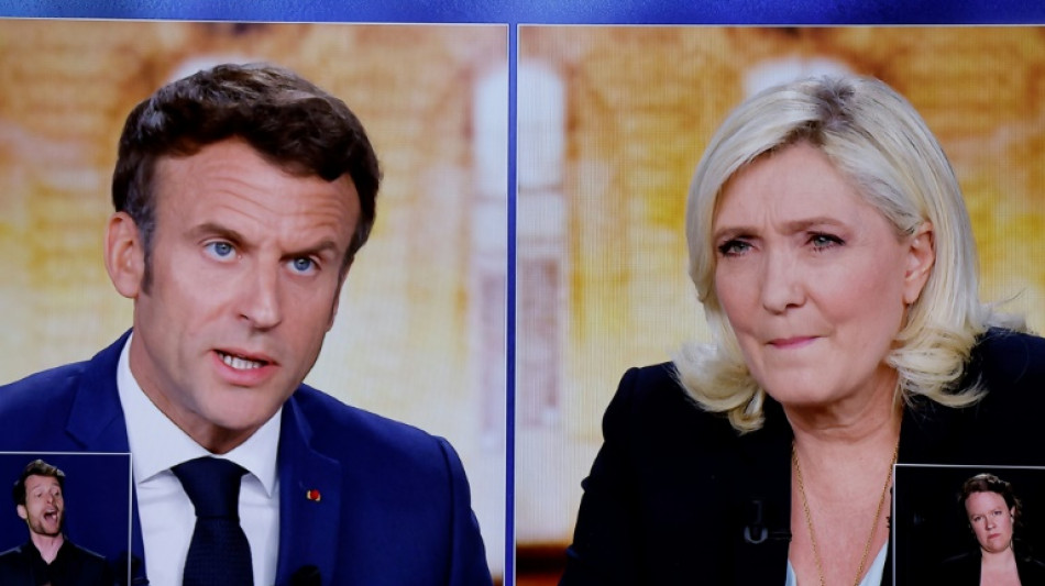 Présidentielle: Macron et Le Pen sur le terrain "jusqu'au bout" pour le dernier jour de campagne