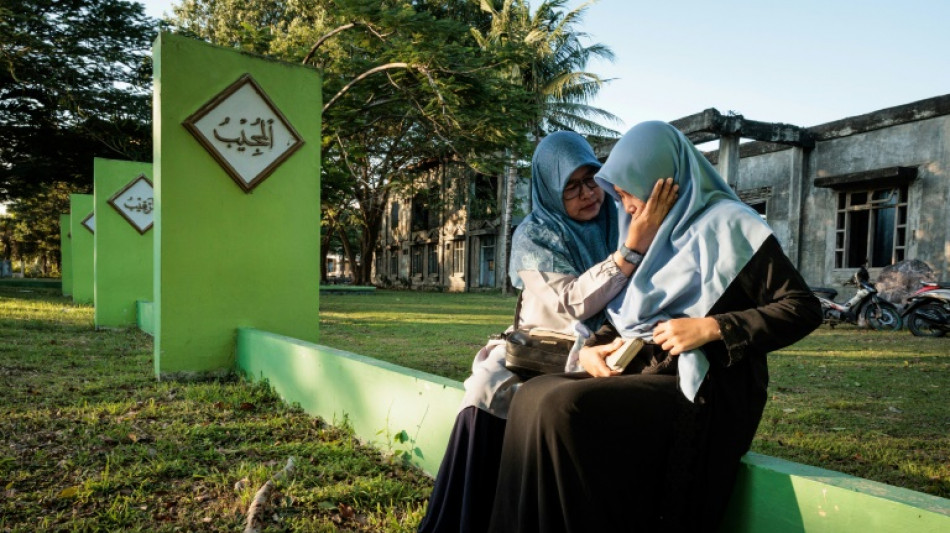 'We couldn't find their bodies': Indonesian tsunami survivors mourn the dead