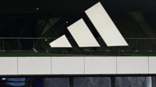 Two employees leave Adidas amid China graft probe
