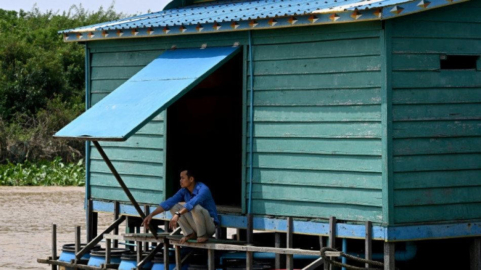 'Floating toilets' help Cambodia's lake-dwelling poor