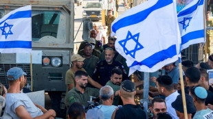 Israel army says 9 soldiers held over suspected abuse of detainee