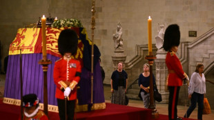 Tens of thousands queue in London to pay respects to queen's coffin