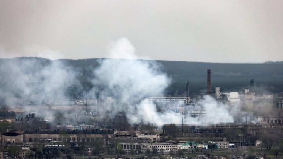 Air strikes hit western Ukraine as Russian forces mass in the east
