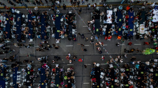 Unas tres mil personas asisten a una cena navideña para los sin techo en Buenos Aires