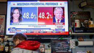 Asian markets swing ahead of toss-up US election