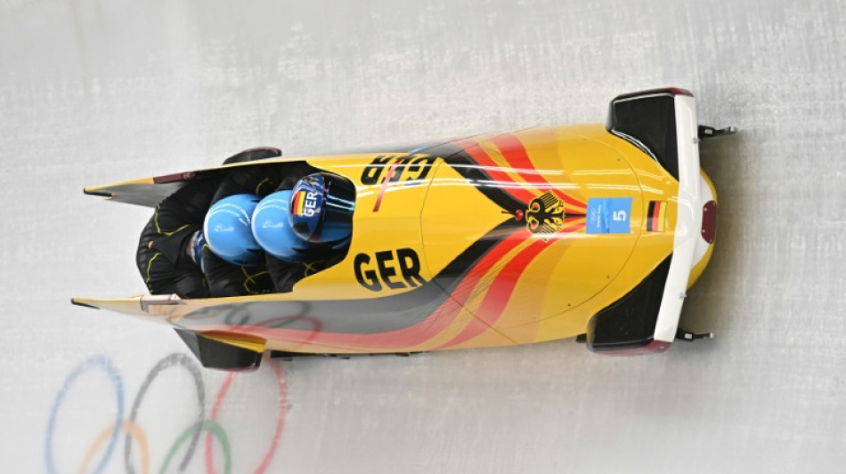 Germany's Friedrich writes history with Olympic bobsleigh double