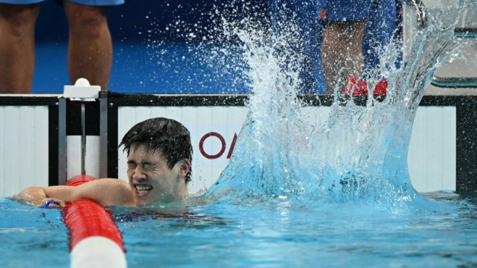 China's Pan wins 'magic' 100m freestyle gold in new world record