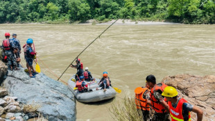 Nepal recovers first body from buses swept away by landslide