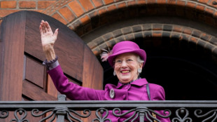 Denmark's queen delights jubilee crowds after family spat