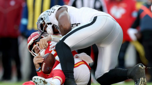 Chiefs hold off Raiders to clinch NFL playoff berth