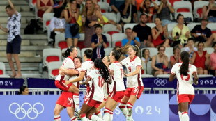 Canada shake off points deduction to reach Olympic football knockouts