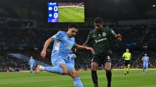 Man City cruise into Champions League quarters despite Sporting stalemate