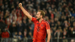 Kane hat-trick sends Bayern top past Leipzig