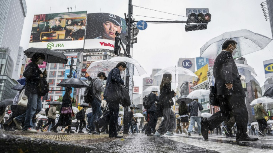 One dead, two missing in Japan after heavy rain