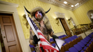 US Capitol rioter 'QAnon Shaman' getting headdress, spear back