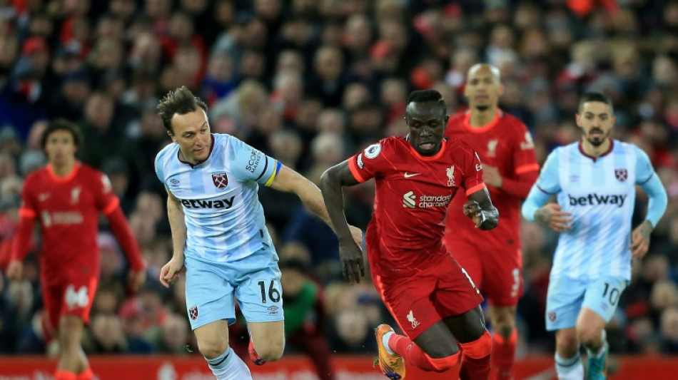 Liverpool ride their luck to cut gap on Man City