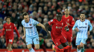 Liverpool ride their luck to cut gap on Man City