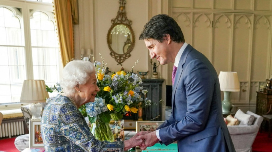 Queen Elizabeth II greets Trudeau in person after Covid scare 