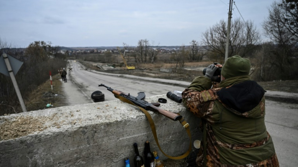 'We will blow it up': Last bridge to Kyiv stalls Russian advance